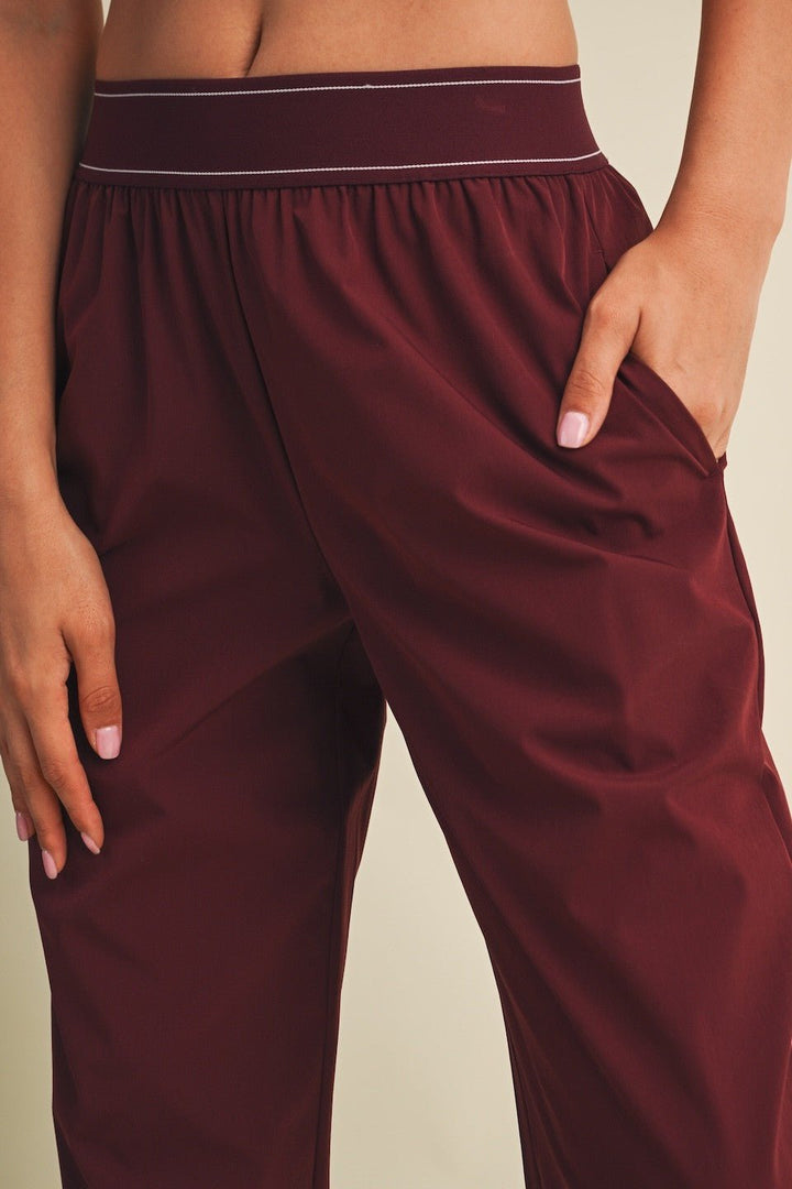 Burgundy Relaxed Nylon Pants - STYLED BY ALX COUTURETrack Pants
