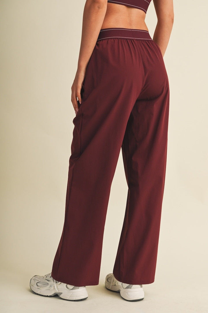 Burgundy Relaxed Nylon Pants - STYLED BY ALX COUTURETrack Pants