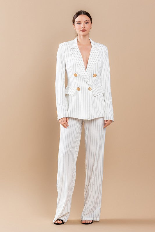 model is wearing White Stripe Jacket Suit Set and black heels 