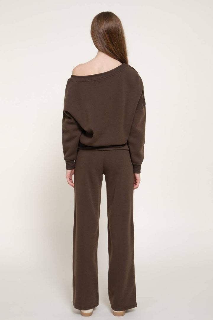 Back view of the chocolate brown asymmetrical neck sweat set showing the relaxed fit