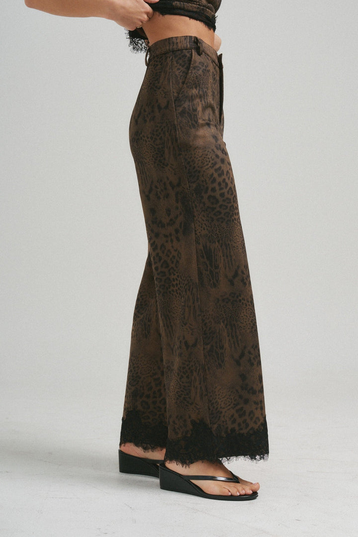 Chocolate leopard pants with lace trim, full length side view