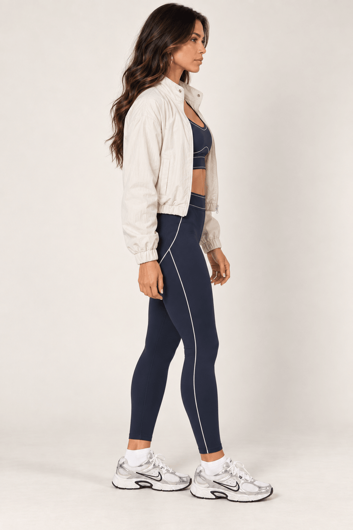 Cream Cropped Nylon Windbreaker Jacket - STYLED BY ALX COUTURECoats &amp; Jackets