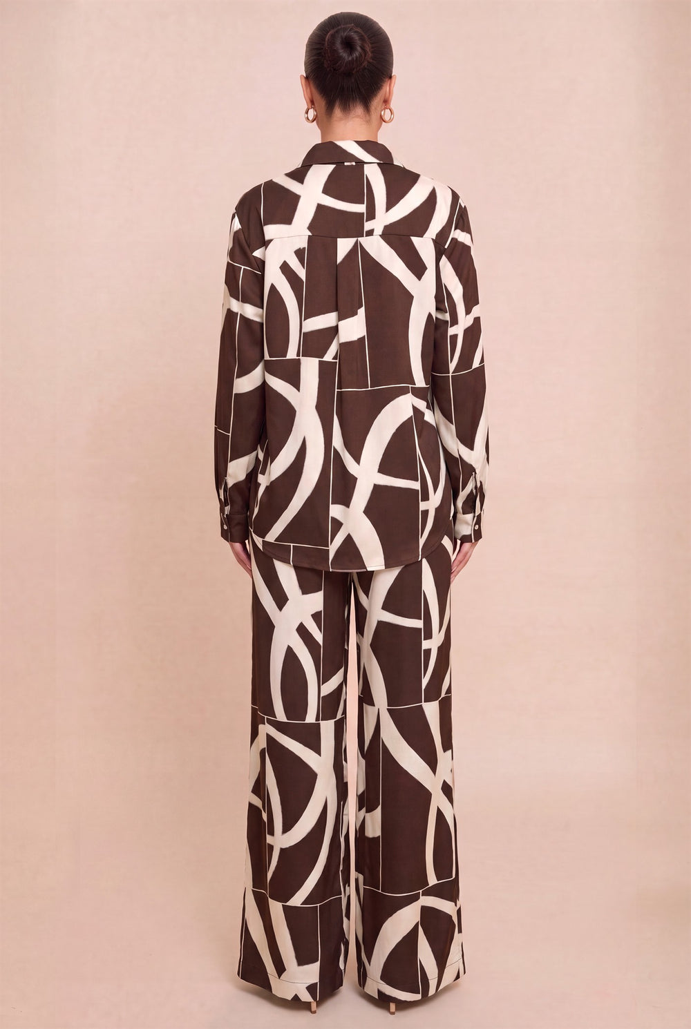 Back view of Luxxel matching abstract print shirt and pants