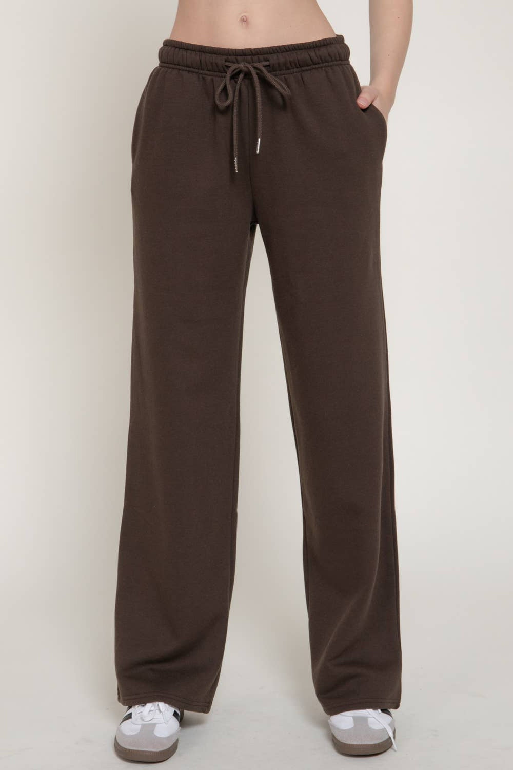 Front view of the dark brown straight leg inner fleece jogger pants with drawstring waist and side pockets