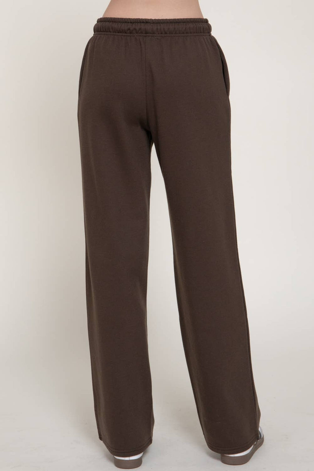 Front view of the dark brown fleece lined straight leg sweatpants with elastic waist