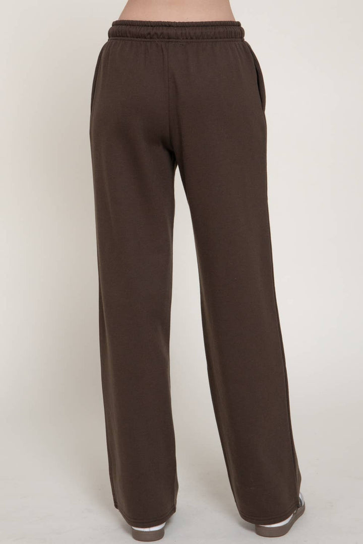 Front view of the dark brown fleece lined straight leg sweatpants with elastic waist