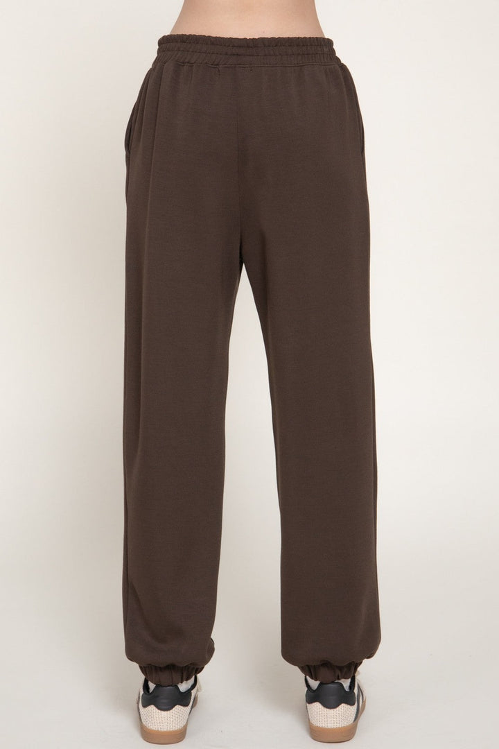 Dark brown pintuck soft scuba jogger pants, front view