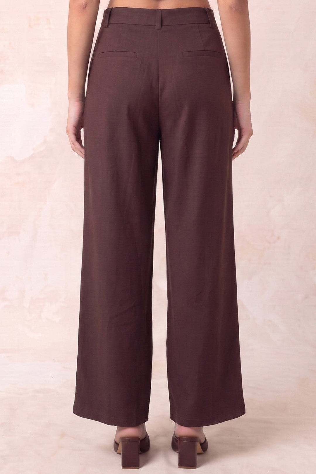 Dark chocolate wide leg pants, back view