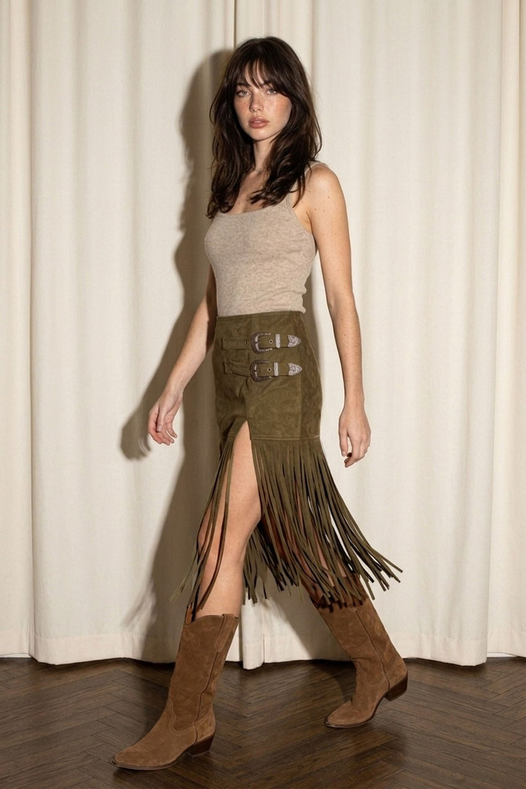 Dark olive faux suede fringe skirt, seated