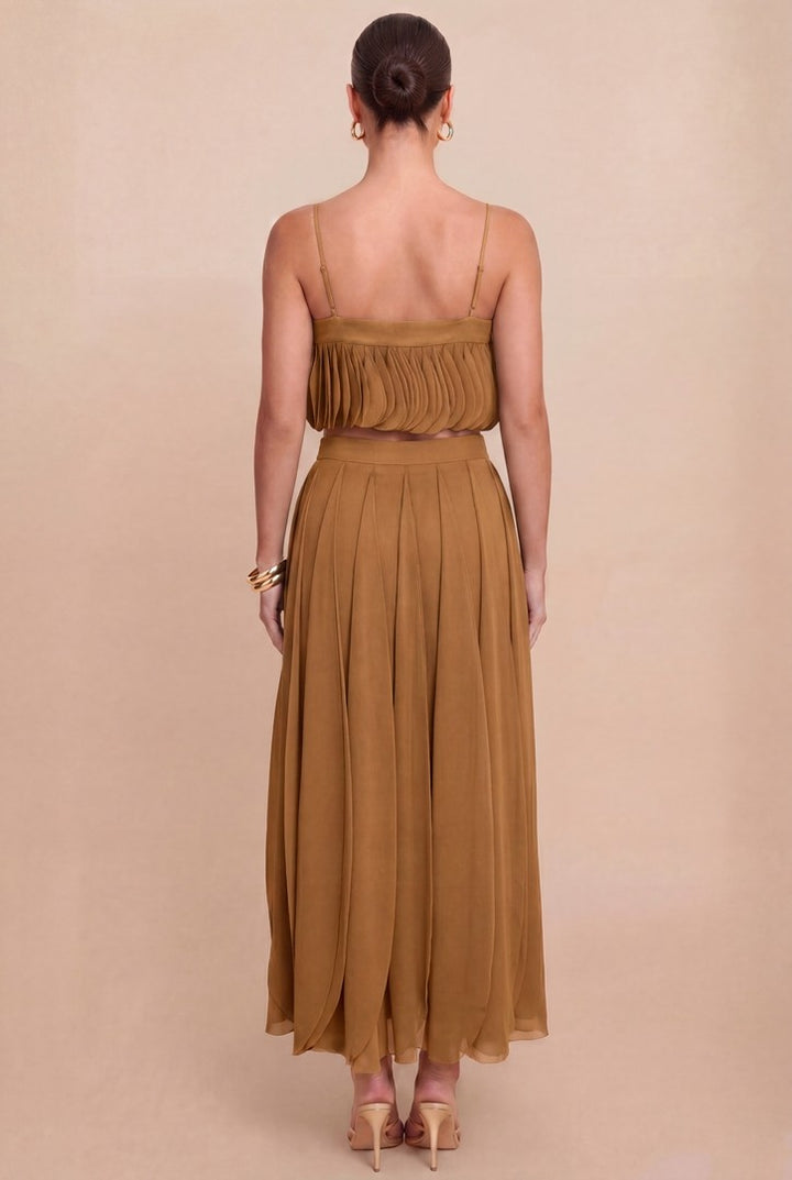 Back view of Luxxel mocha skirt set with layered petal panels