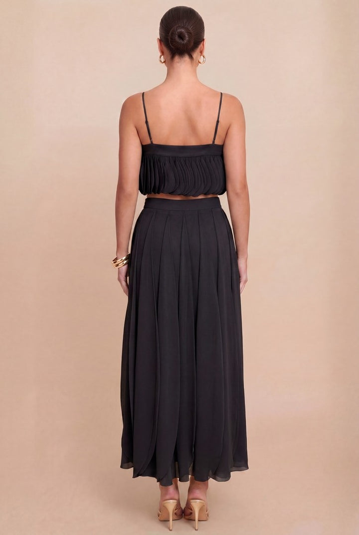 Back view of Luxxel black petal layer skirt set