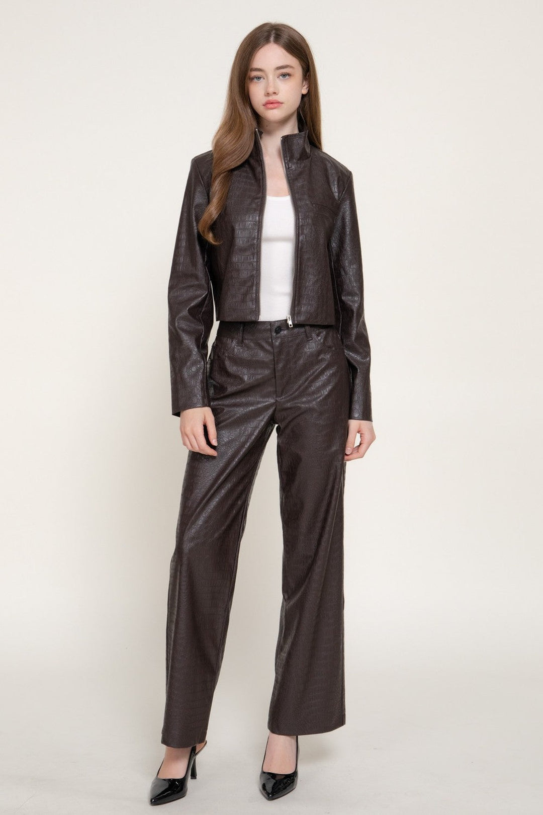Front view of the espresso croc faux leather pants styled with the matching cropped jacket, a Thanksgiving outfit