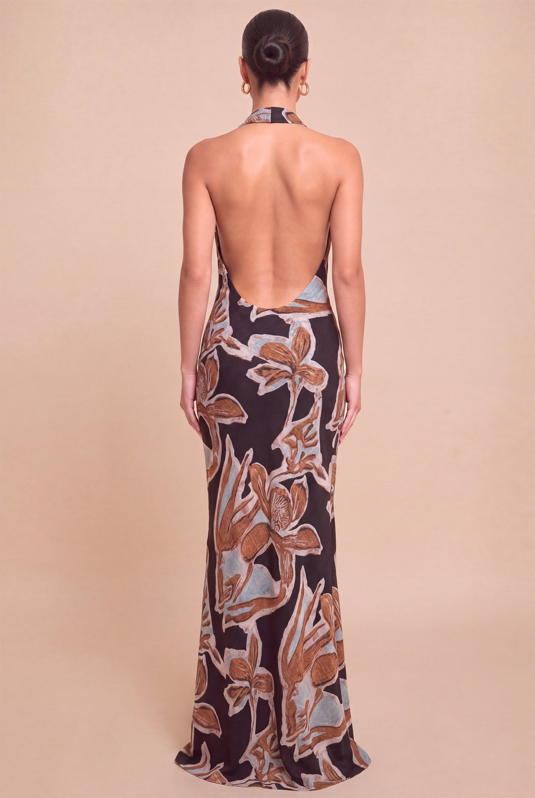 Back view of Luxxel abstract floral halter maxi dress showing the deep open back