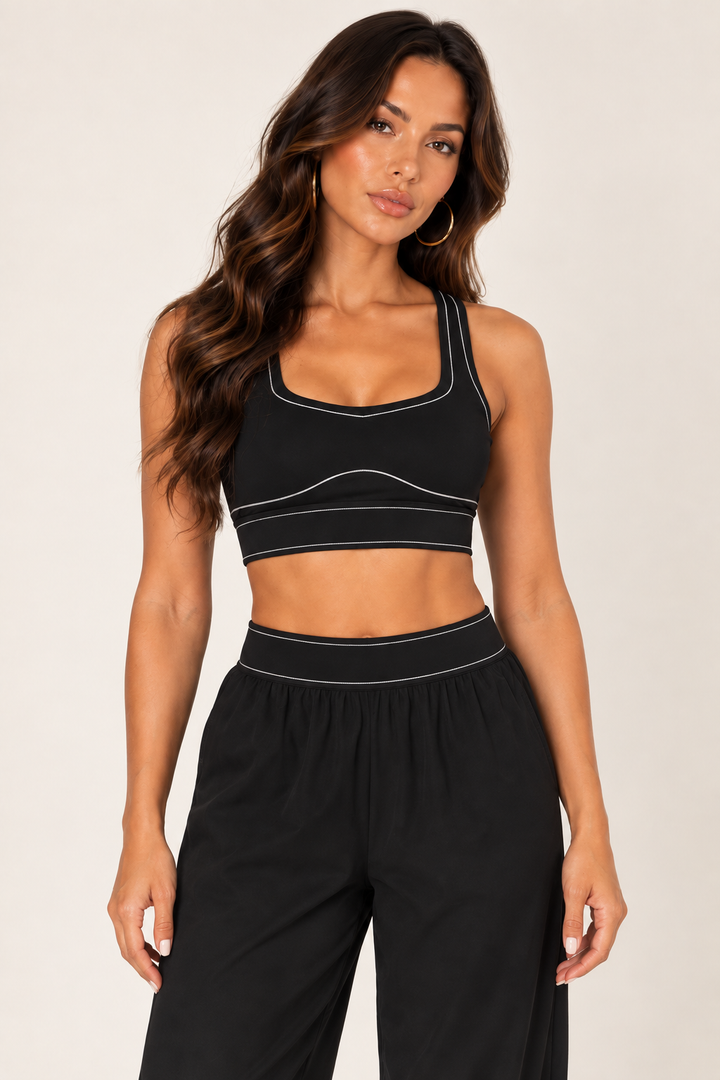 Black sports bra — bra neckline detail; coordinating pieces sold separately