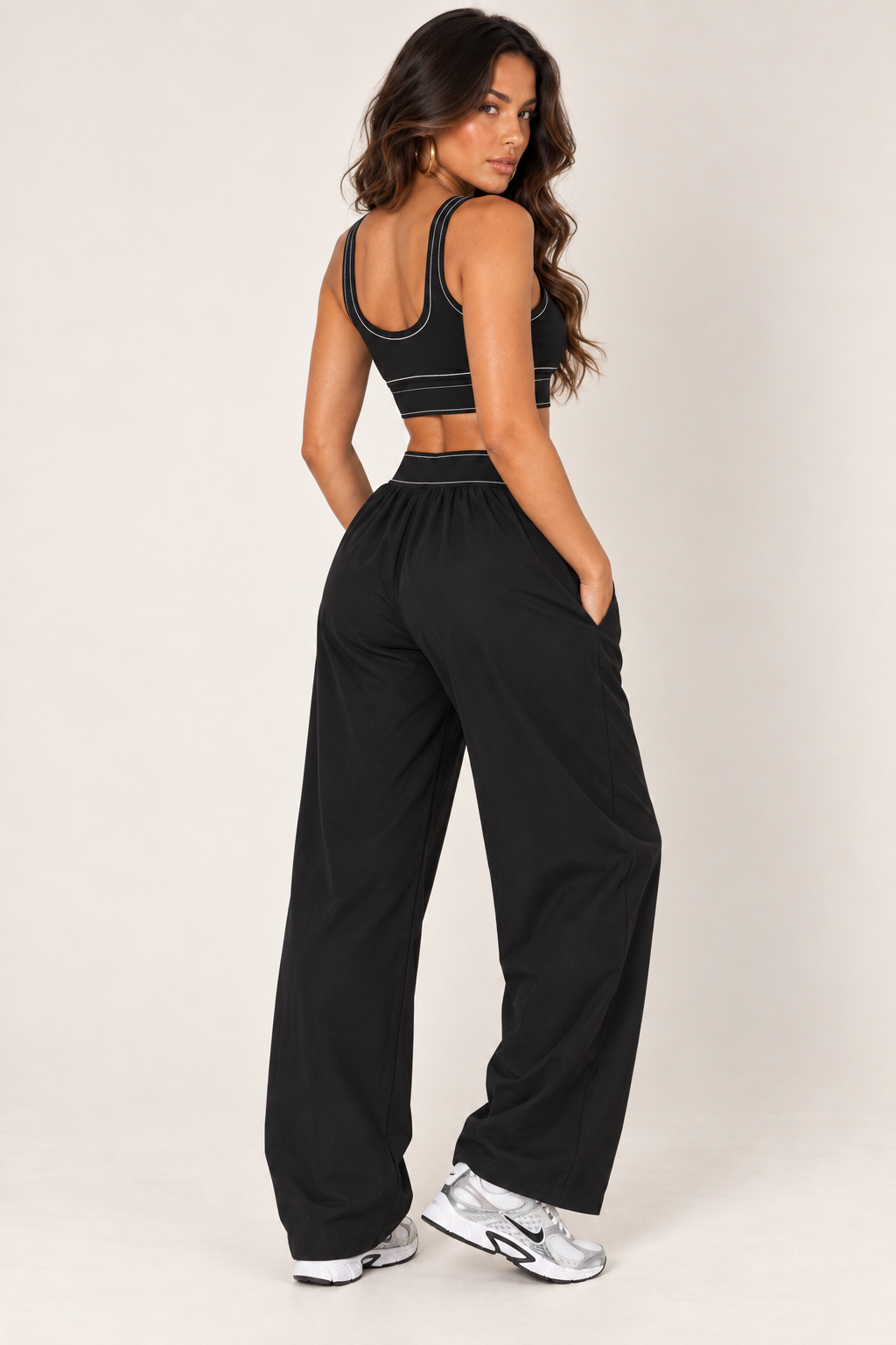 Black track pants — track full rear three quarter; coordinating pieces sold separately