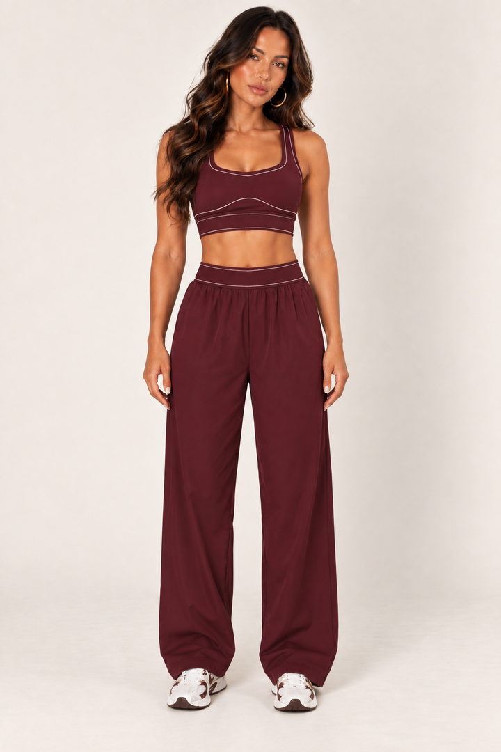 Glowy burgundy track pants — track full front