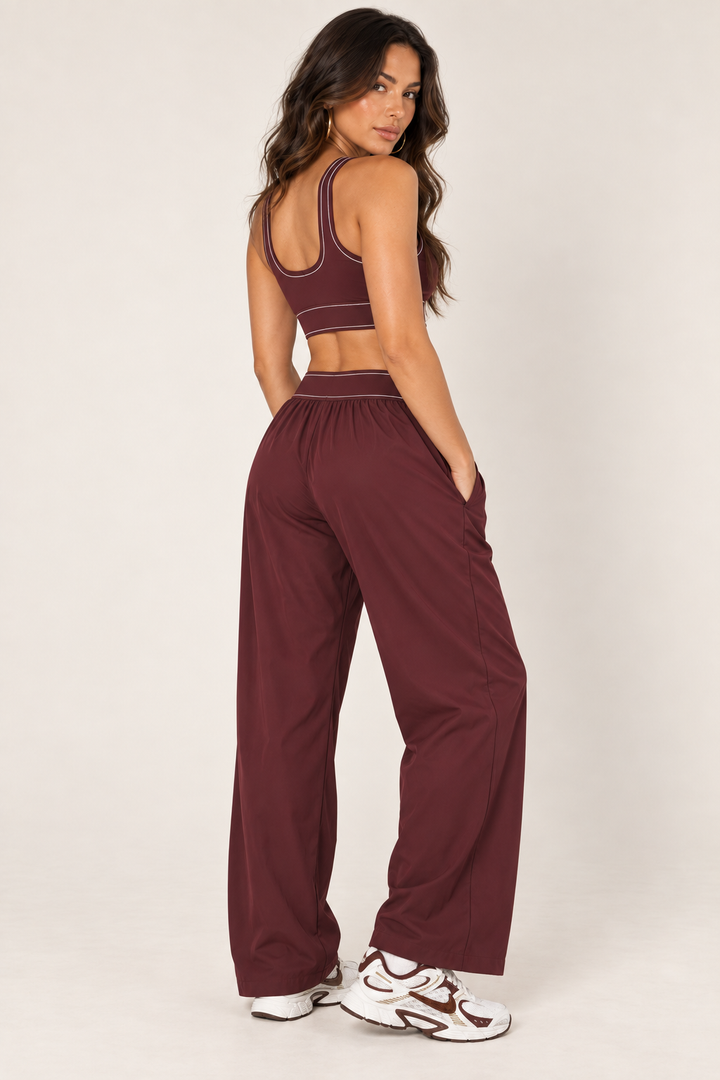 Glowy burgundy track pants — track full rear three quarter