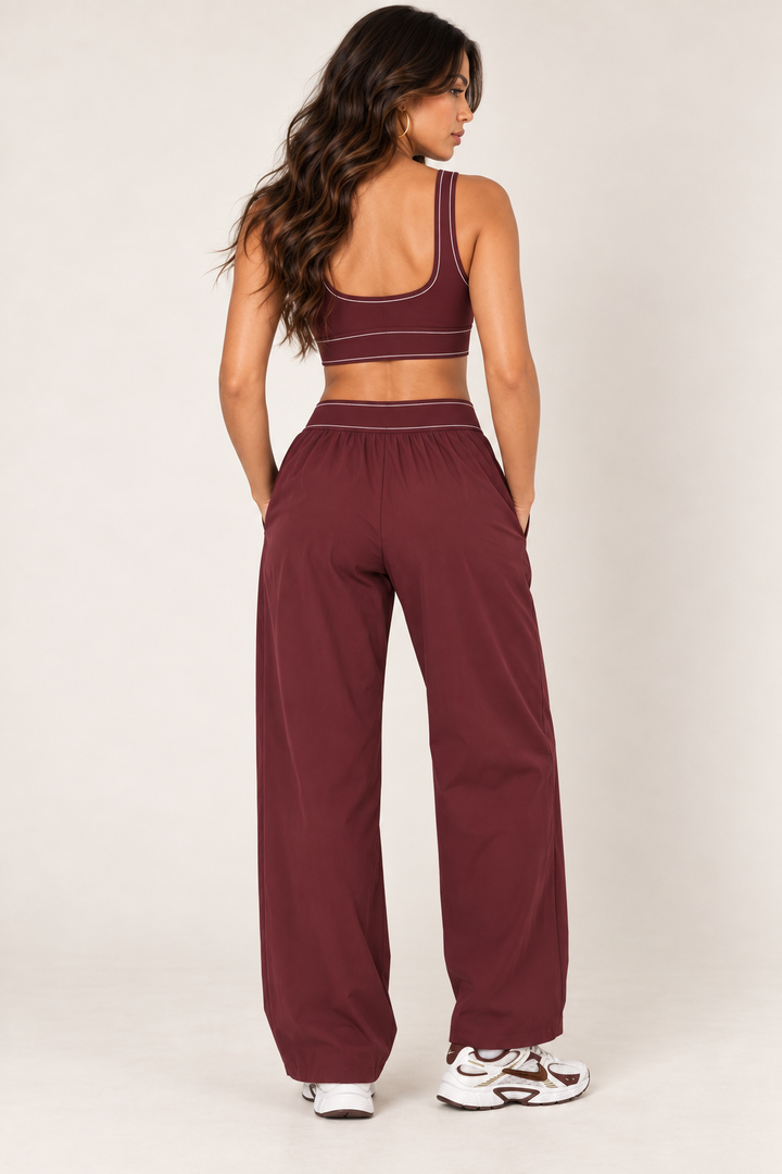 Glowy burgundy track pants — track back crop