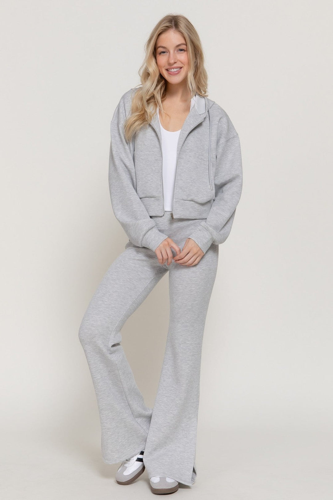 Heather grey scuba flare pants worn as a set with the heather grey hoodie jacket