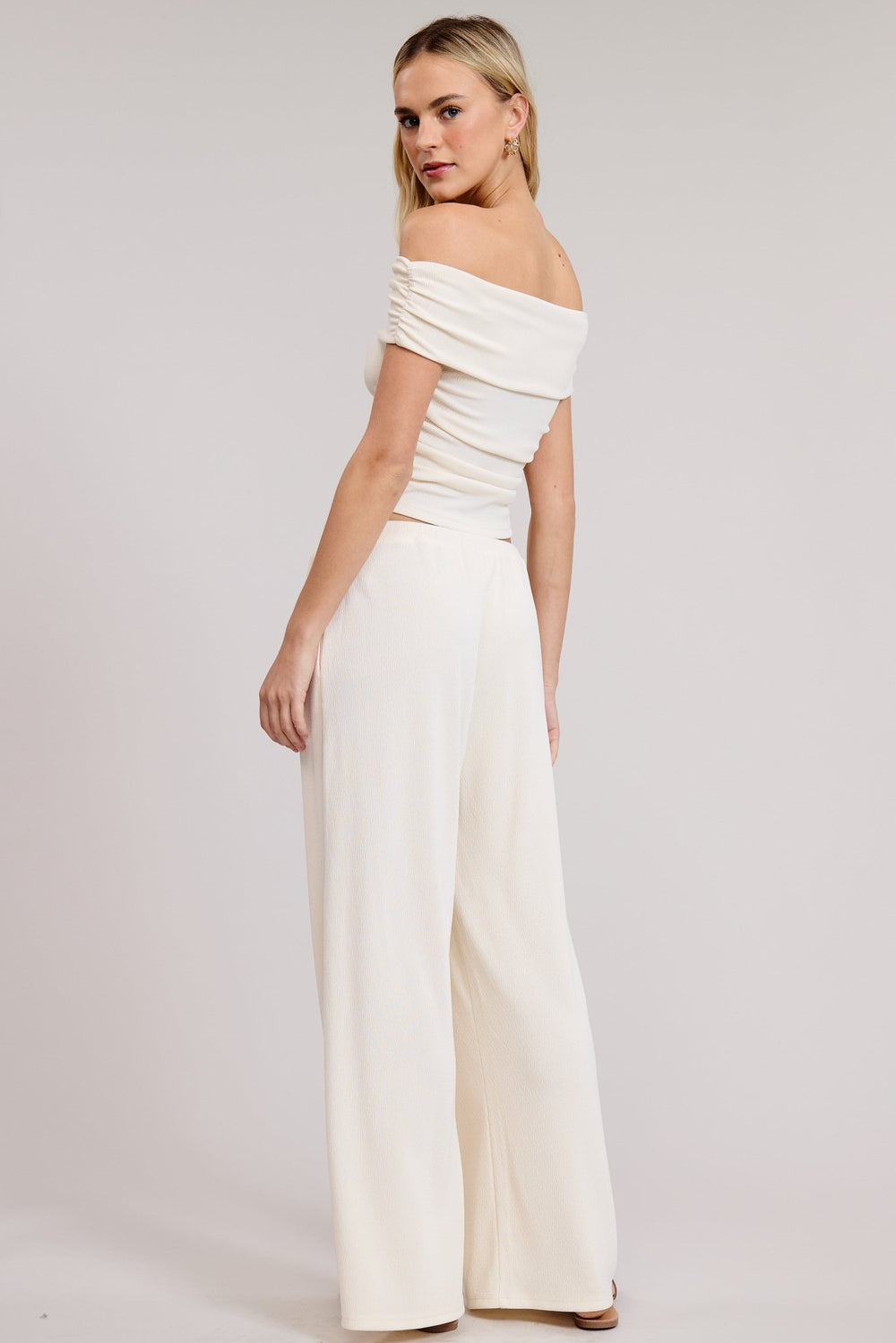 Off shoulder neckline detail on the ivory two piece set