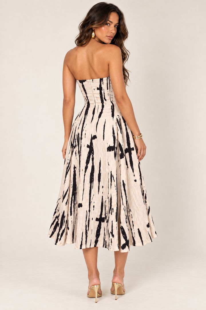 Back view of taupe black textured strapless midi dress on the ALX hair-down model