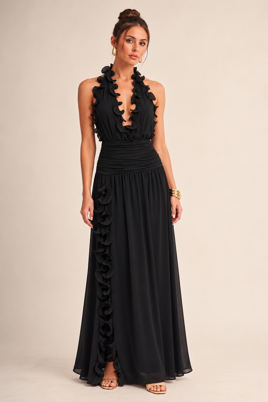 ALX model wearing Luxxel black ruffle trim chiffon maxi dress with gold accessories