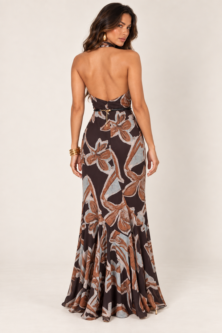 Back view of brown abstract floral belted halter maxi dress on the ALX hair-down model