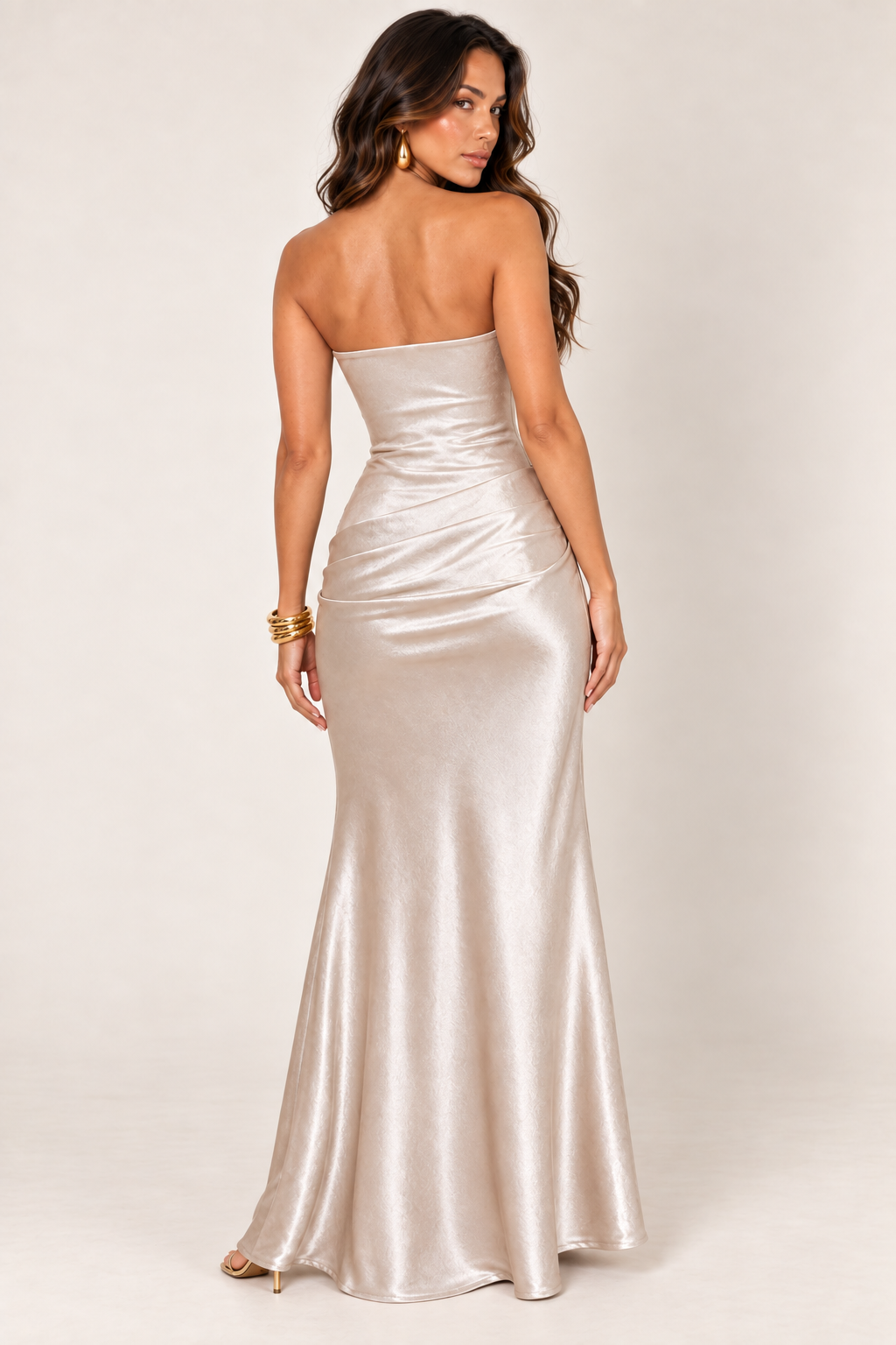Back view of rose champagne shirred maxi dress on the ALX hair-down model