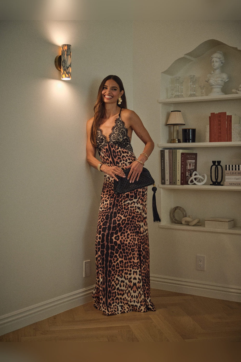 Front view of the leopard print satin maxi dress with black lace trim V-neck, a New Year's Eve dress