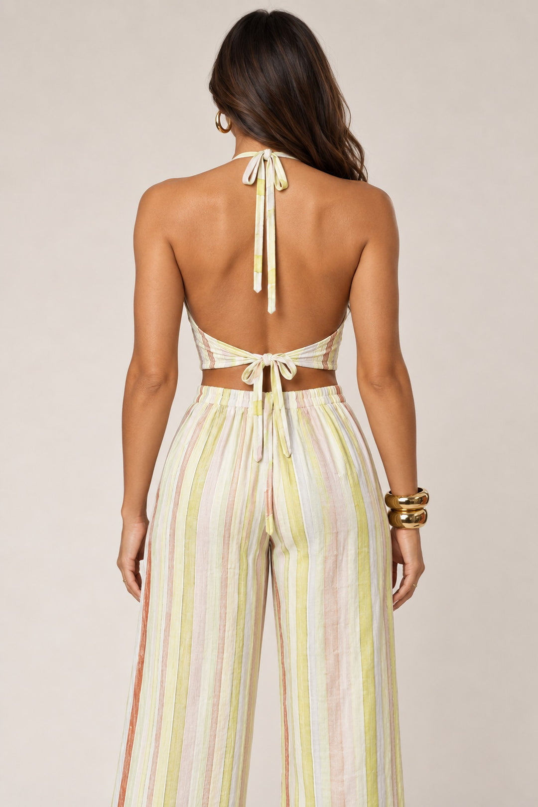 Lime striped halter pant set showing the open tie back, back view