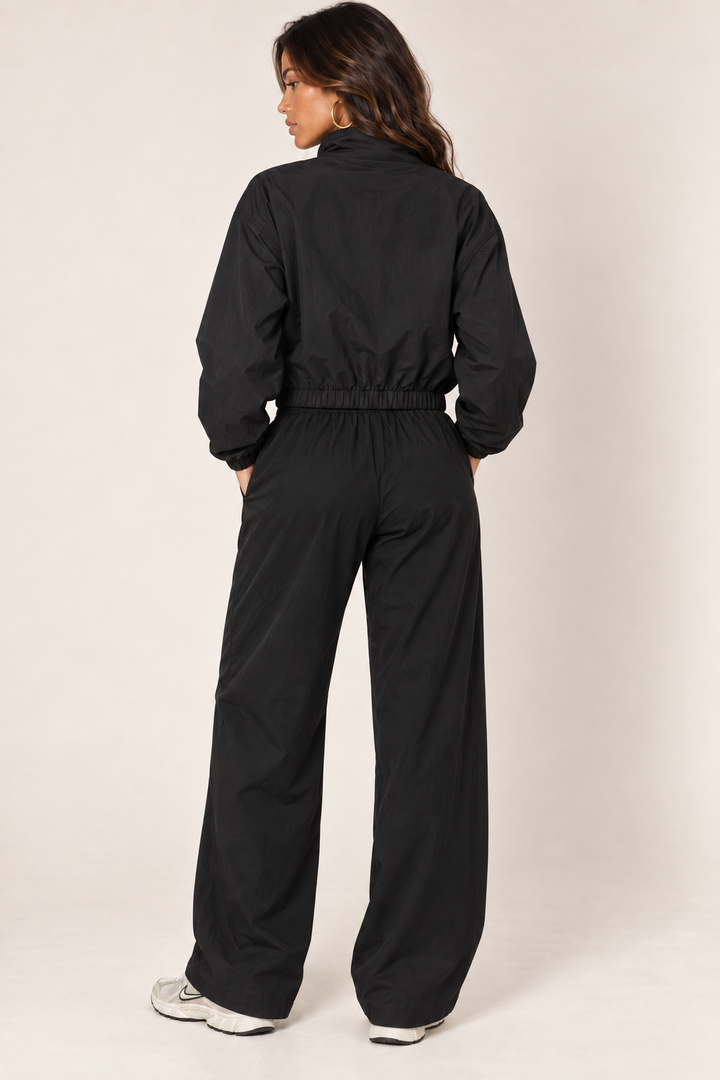 Black cropped windbreaker — full back