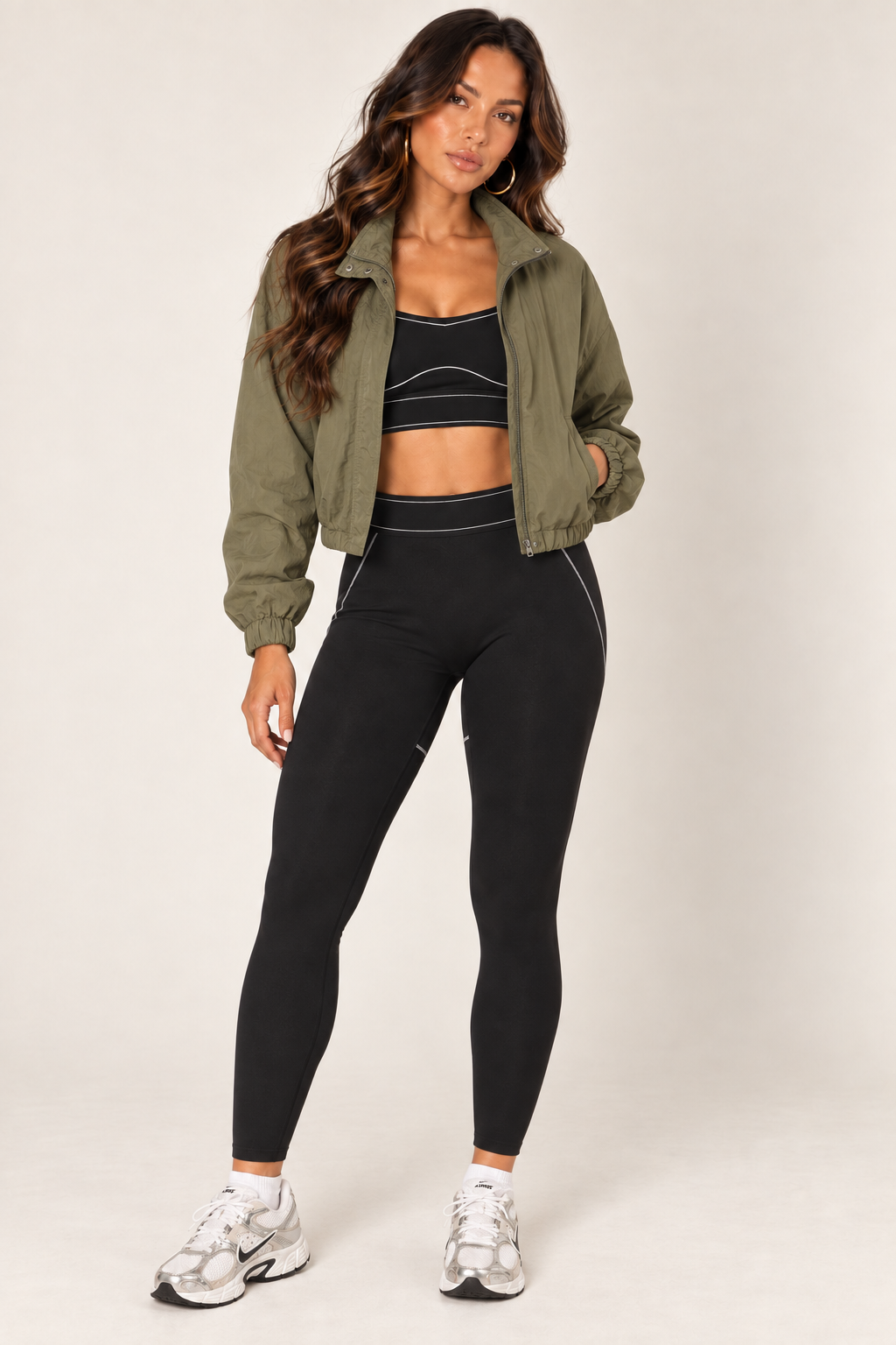 Olive cropped windbreaker with black leggings — full front open