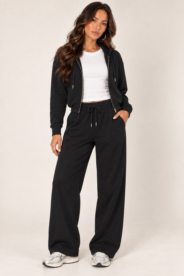 Black LOVE TREE cropped zip hoodie and wide-leg sweatpants — Front outfit · fitted white tee