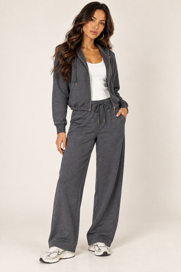 Dark Heather Grey LOVE TREE cropped zip hoodie and wide-leg sweatpants — Left outfit · white ribbed tank