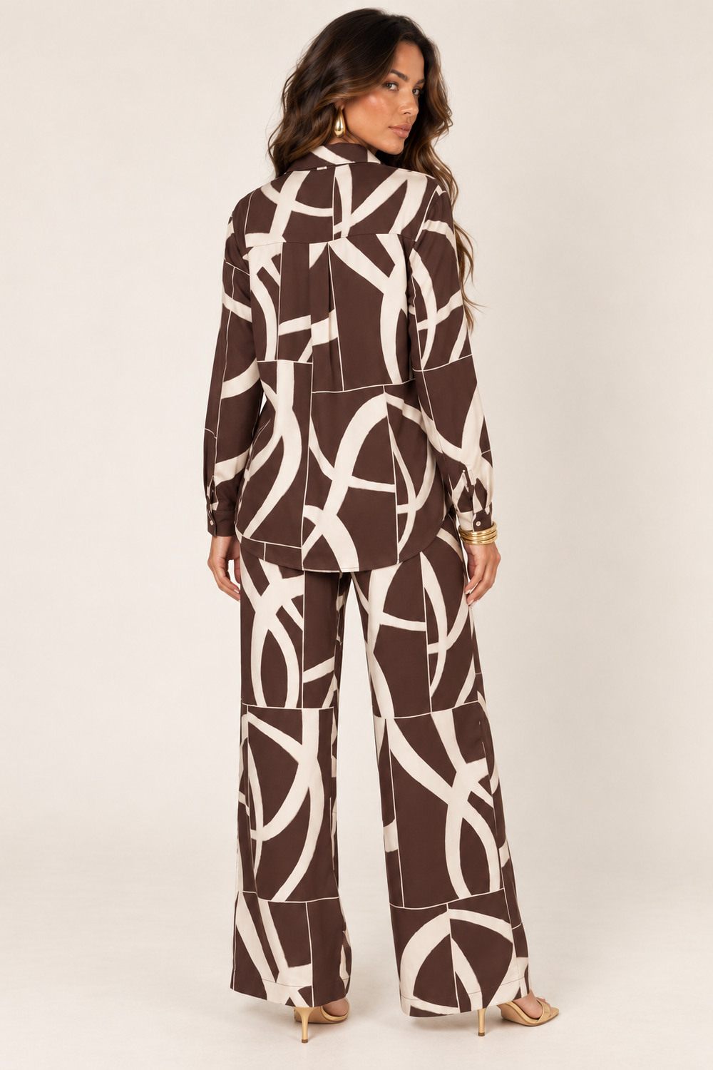 Back view of ivory brown two-tone abstract pant set on the ALX hair-down model