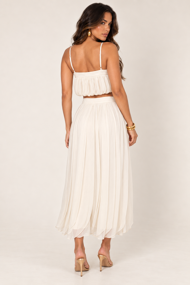 Back view of sand petal layer skirt set on the ALX hair-down model
