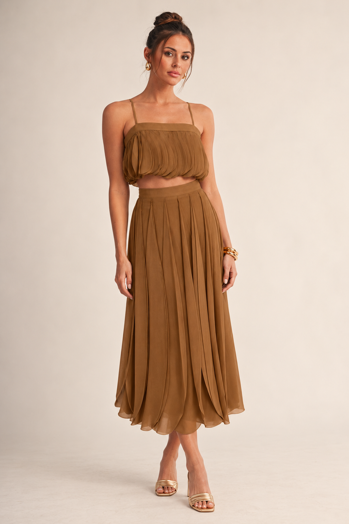 ALX model wearing Luxxel mocha petal layer skirt set with gold accessories