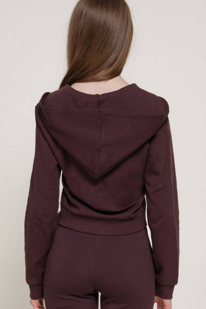 Back view of the maroon hoodie knit jacket showing the hood and ribbed hem