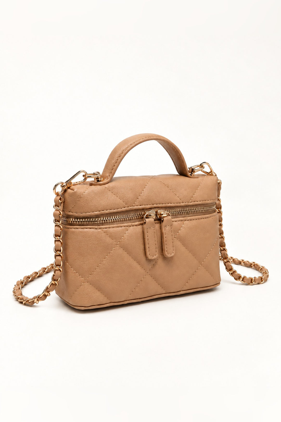 Angled view of the tan quilted crossbody bag showing gold-tone double zipper and structured shape