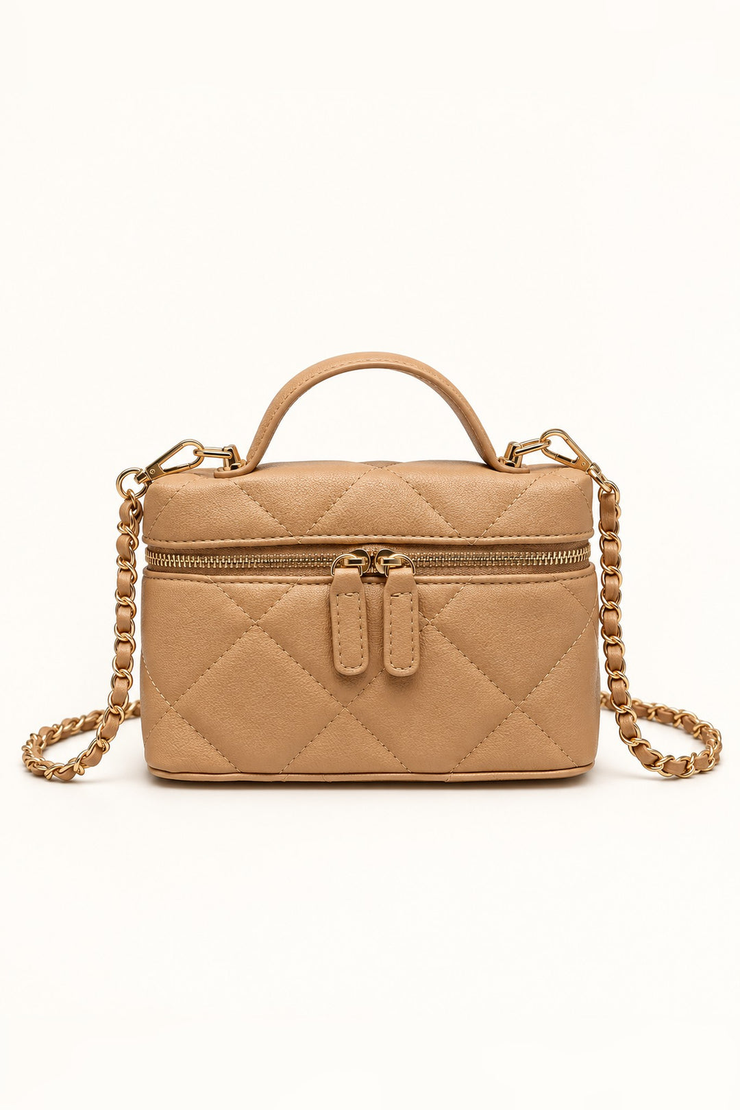 Front view of the Natural Snow Quilted Crossbody in tan vegan leather with gold chain strap and top handle