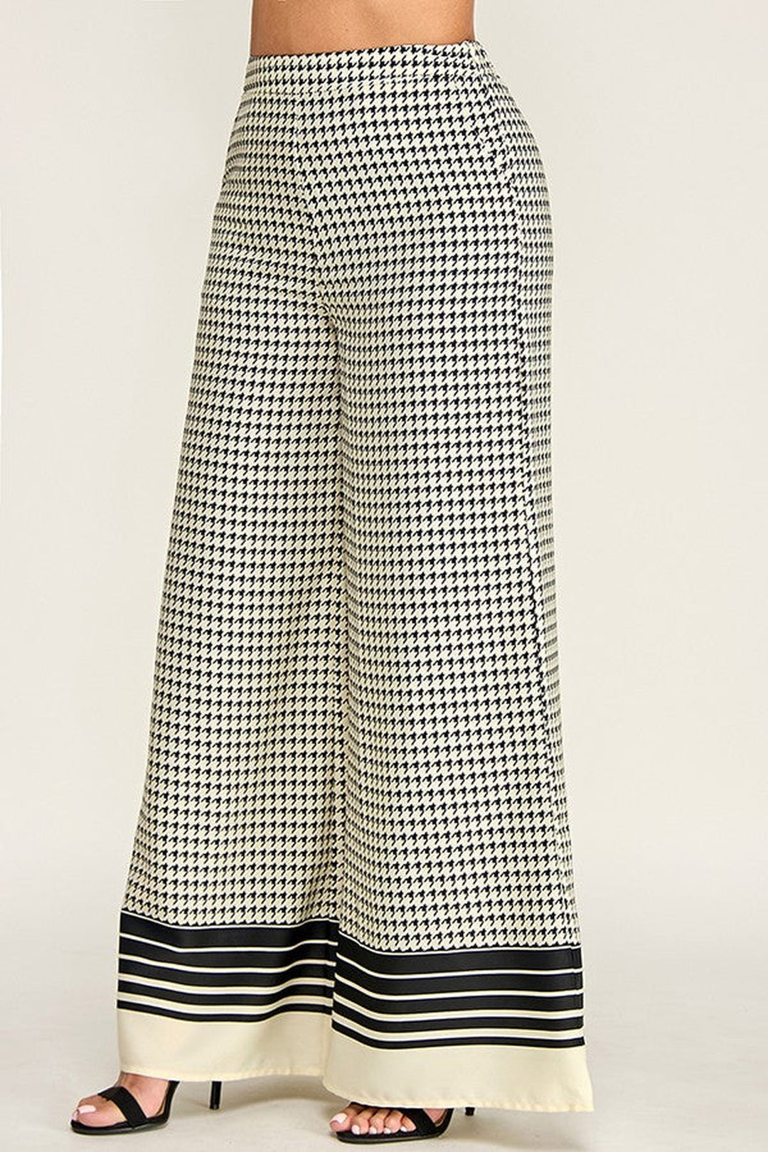 Checkered palazzo pants with wide flowing leg, side view