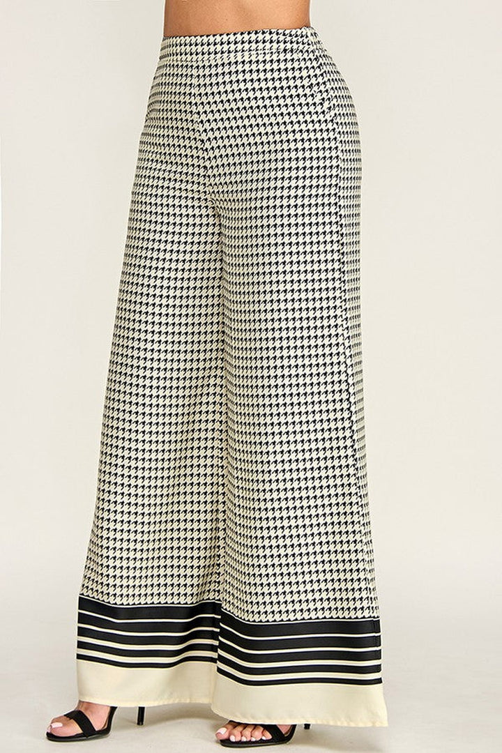 Checkered palazzo pants with wide flowing leg, side view