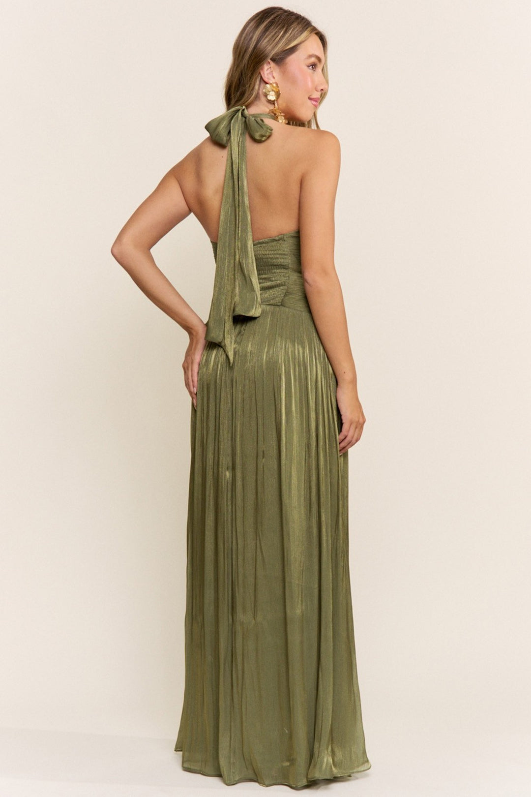 Olive pleated halter maxi dress showing the tie neck and smocked back, back view