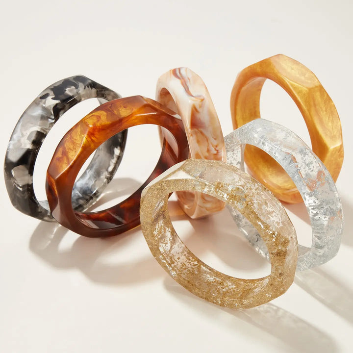 Structured eight sided yellow resin bangle, approx 3 1/2 inch outer diameter