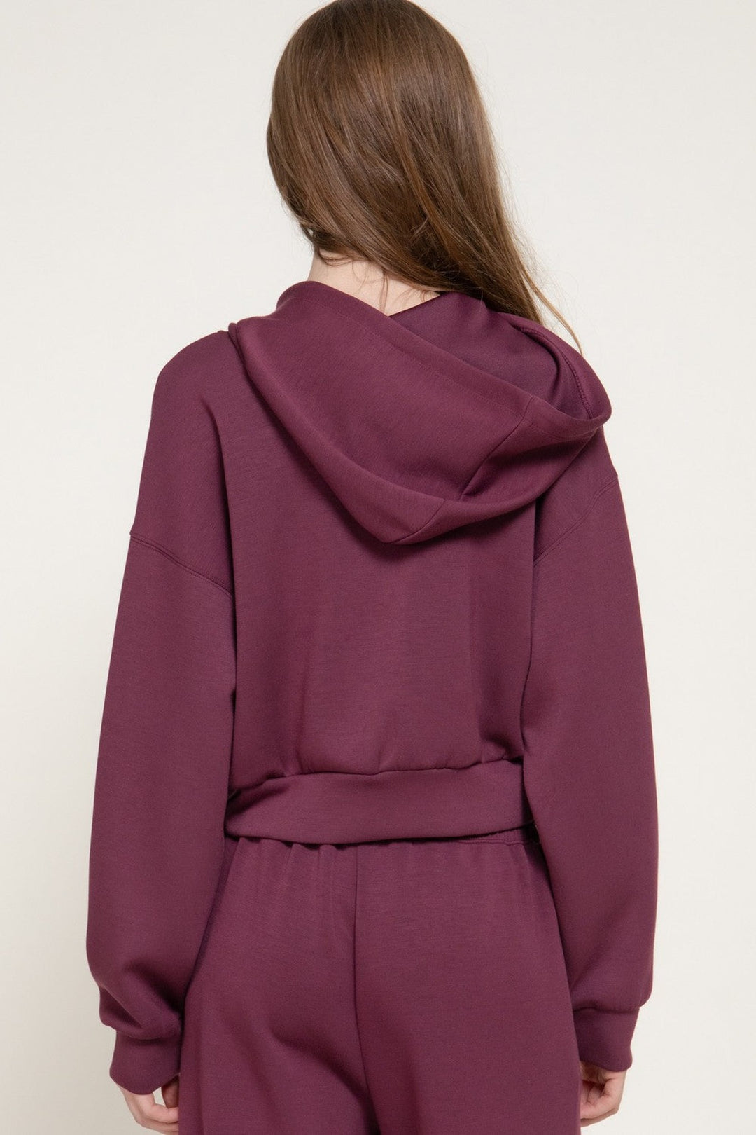 Plum cropped hoodie jacket, back view