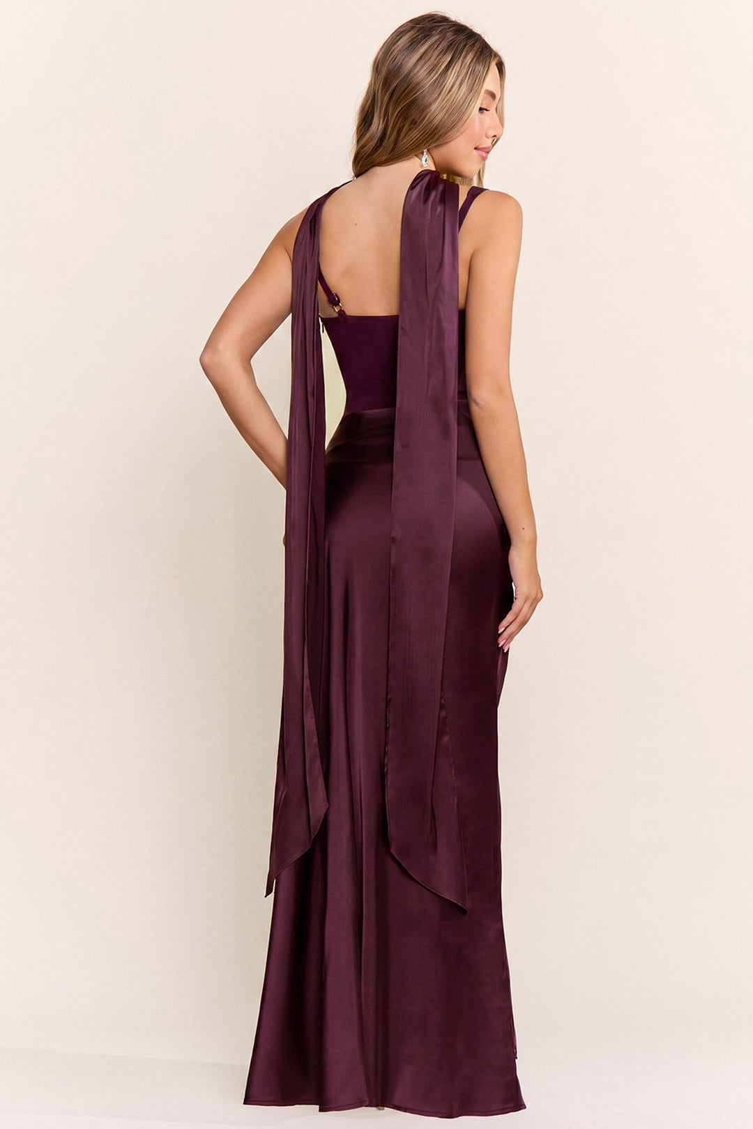 Purple corset maxi dress with scarf draped over the shoulder, back view