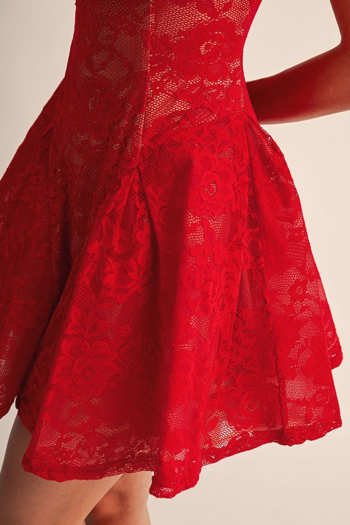 Close up of the red floral lace and flared skirt