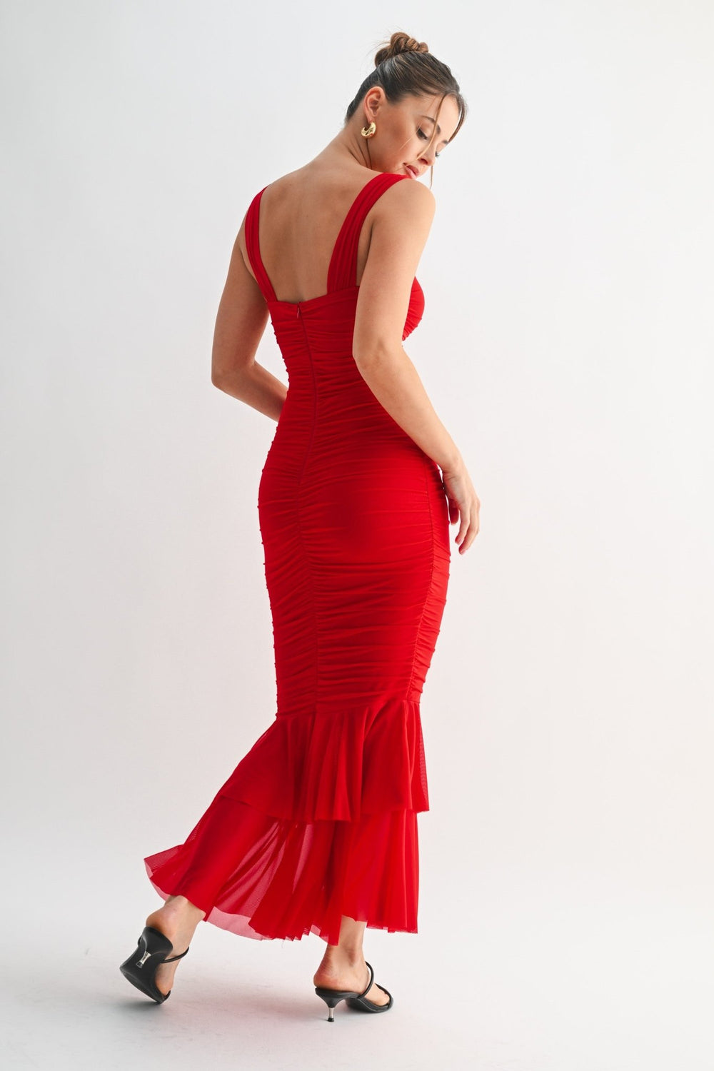 Red flounce gown in stretch nylon mesh with a sculpting ruched body
