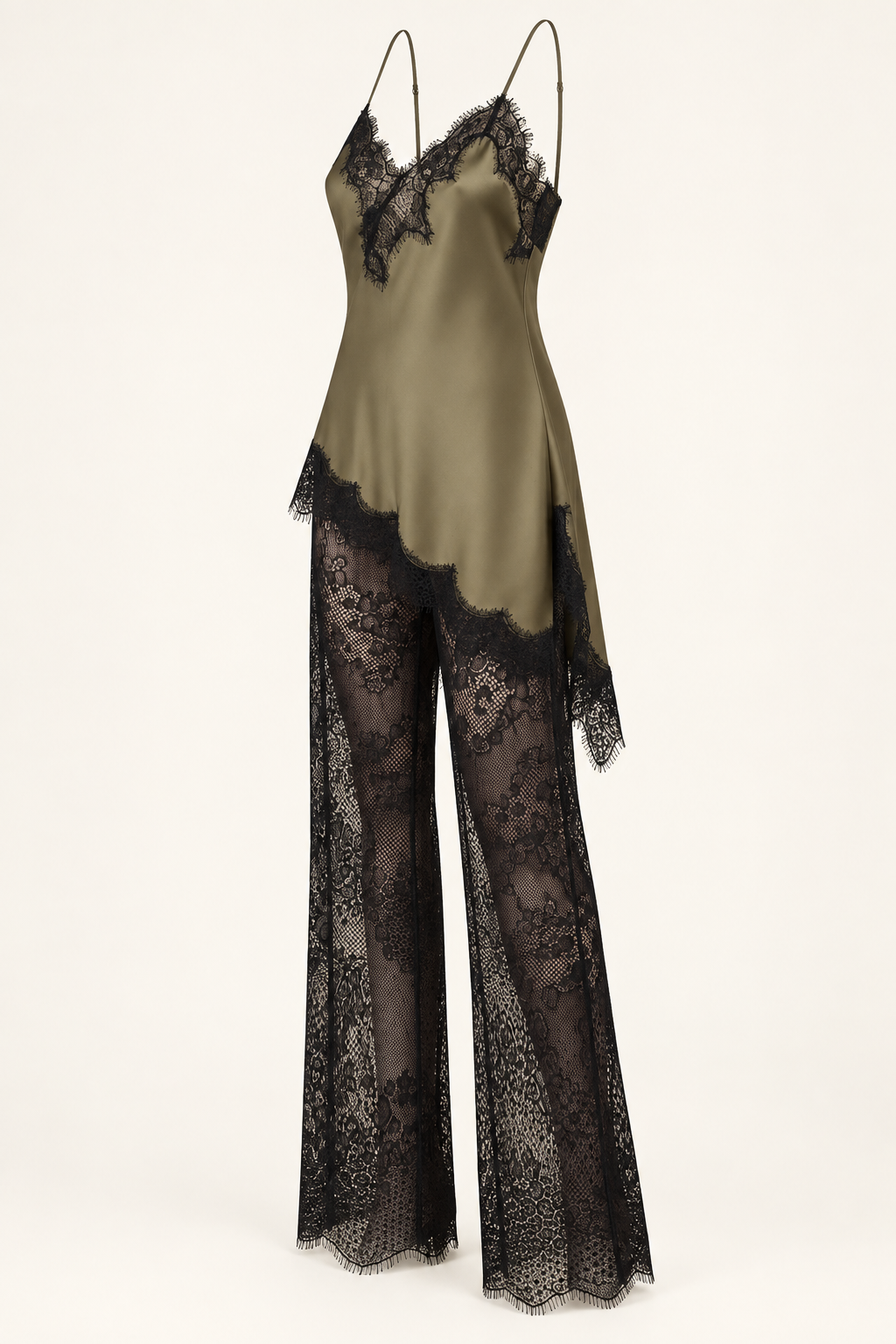 Angled side product view of the Khaki Satin Lace Pants Set by Skylar Rose at Styled by ALX, shown on invisible support. The image reveals the loose olive satin camisole drape, asymmetric black lace-trim hem and flowing black floral lace trousers against an ivory background.