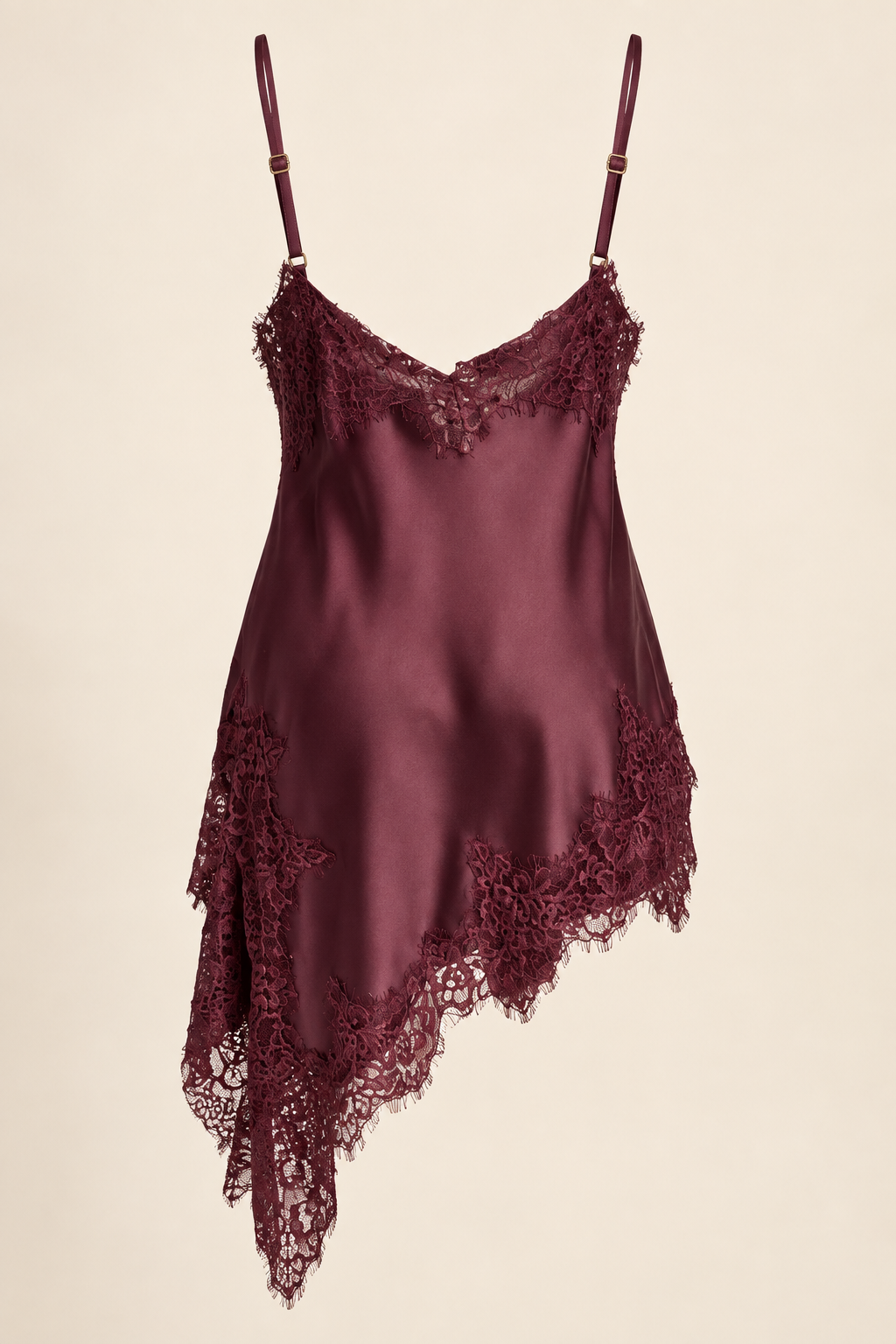 Product-only back view of the camisole from the Burgundy Satin Lace Pants Set at Styled by ALX, showing thin adjustable straps with small metal sliders, a shallow lace-edged neckline and a long asymmetric lace hem. The deep wine satin drapes naturally against a warm ivory studio background.
